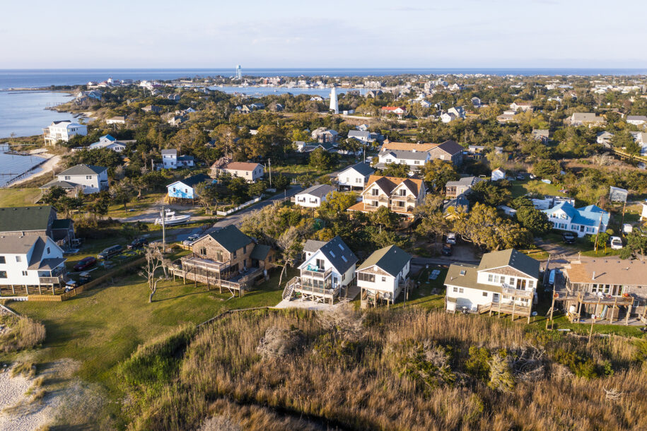 aerial of cottages and lighthouse